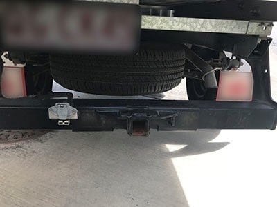 A car and caravan jack-knife on the Bruce Highway. Image credit: Clayton's Towing.